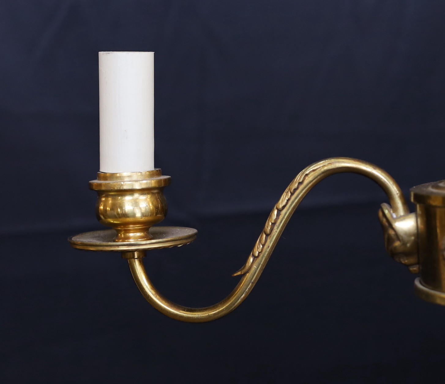 A 1930s French lacquered bronze three branch light fitting, height 35cm. width 38cm